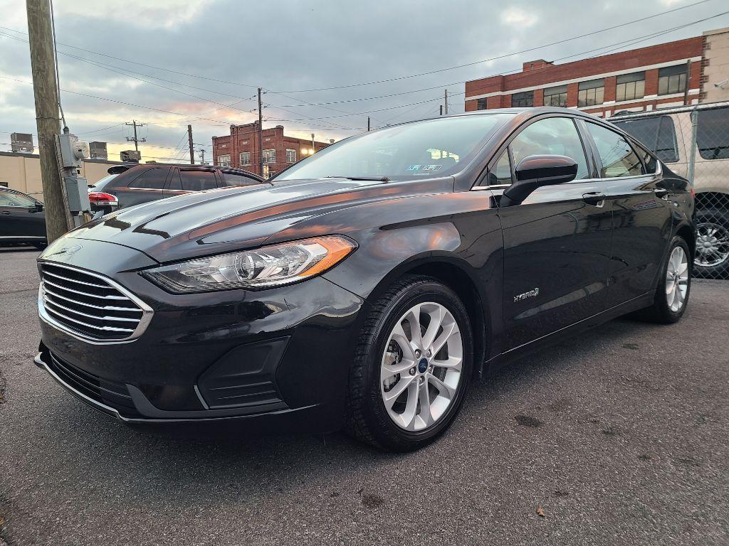 2019 BLACK FORD FUSION SE (3FA6P0LU4KR) with an 2.0L engine, Continuously Variable transmission, located at 7981 Paxton Street, Harrisburg, PA, 17111, (717) 561-2926, 40.261490, -76.749229 - Photo #0