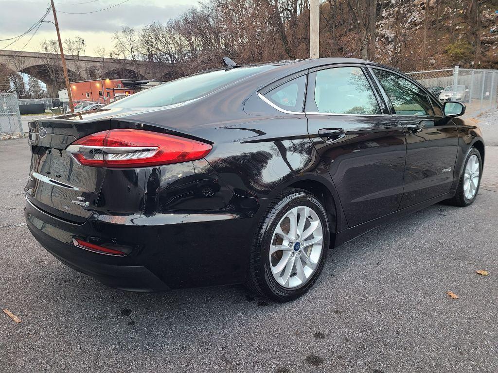 2019 BLACK FORD FUSION SE (3FA6P0LU4KR) with an 2.0L engine, Continuously Variable transmission, located at 7981 Paxton Street, Harrisburg, PA, 17111, (717) 561-2926, 40.261490, -76.749229 - Photo #4