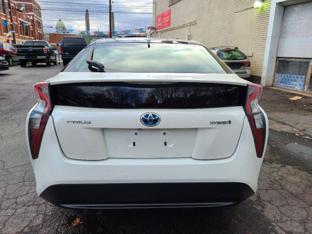 2017 WHITE TOYOTA PRIUS FOUR HATCHBACK (JTDKARFU6H3) with an 1.8L engine, Continuously Variable transmission, located at 7981 Paxton Street, Harrisburg, PA, 17111, (717) 561-2926, 40.261490, -76.749229 - Photo #3