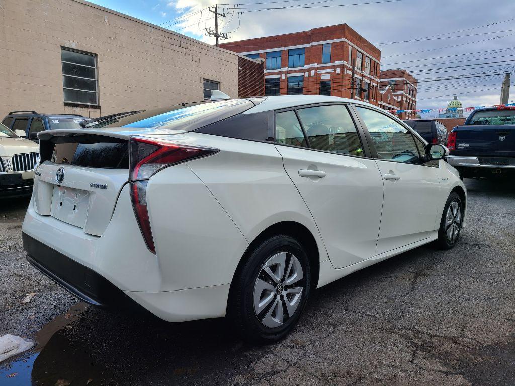 2017 WHITE TOYOTA PRIUS FOUR HATCHBACK (JTDKARFU6H3) with an 1.8L engine, Continuously Variable transmission, located at 7981 Paxton Street, Harrisburg, PA, 17111, (717) 561-2926, 40.261490, -76.749229 - Photo #4