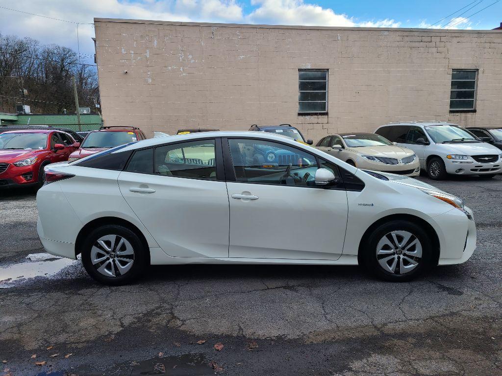2017 WHITE TOYOTA PRIUS FOUR HATCHBACK (JTDKARFU6H3) with an 1.8L engine, Continuously Variable transmission, located at 7981 Paxton Street, Harrisburg, PA, 17111, (717) 561-2926, 40.261490, -76.749229 - Photo #5