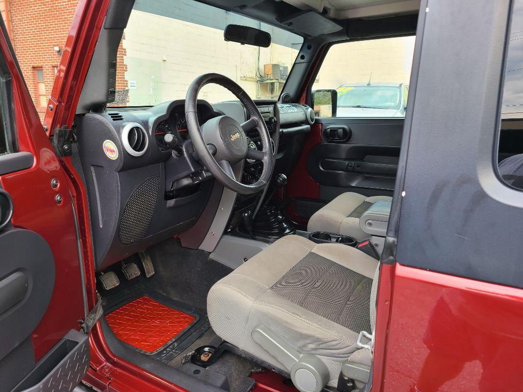 2009 BURGUN JEEP WRANGLER X (1J4FA24179L) with an 3.8L engine, 4-Speed Manual transmission, located at 117 North Cameron Street, Harrisburg, PA, 17101, (717) 963-8962, 40.267021, -76.875351 - WE FINANCE!!! Good Credit/ Bad Credit/ No Credit - ALL Trade-Ins Welcomed!!! ***Guaranteed Credit Approval*** APPLY ONLINE or CALL us TODAY ;) Internet Prices and Marketplace Prices are SPECIAL discounted ***CASH DEALS*** Retail Prices are higher. Please call us to discuss your cash and finan - Photo #14