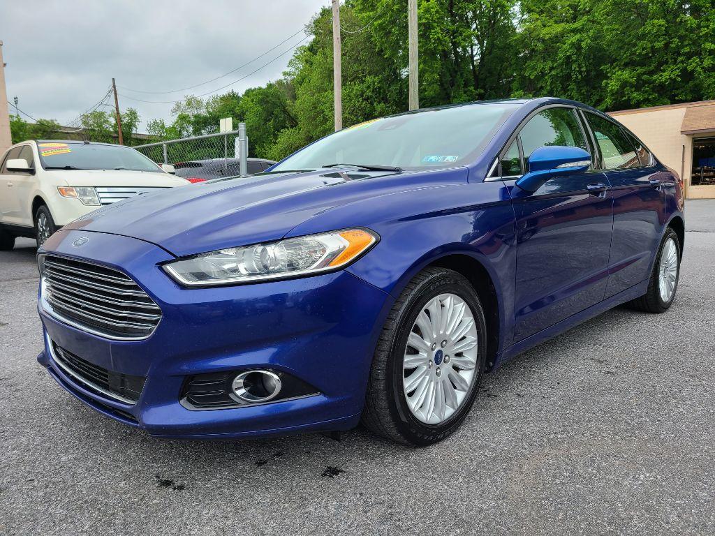 2014 BLUE FORD FUSION SE HYBRID (3FA6P0LU0ER) with an 2.0L engine, Continuously Variable transmission, located at 117 North Cameron Street, Harrisburg, PA, 17101, (717) 963-8962, 40.267021, -76.875351 - Photo #0