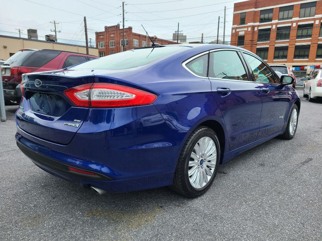 2014 BLUE FORD FUSION SE HYBRID (3FA6P0LU0ER) with an 2.0L engine, Continuously Variable transmission, located at 117 North Cameron Street, Harrisburg, PA, 17101, (717) 963-8962, 40.267021, -76.875351 - Photo #4