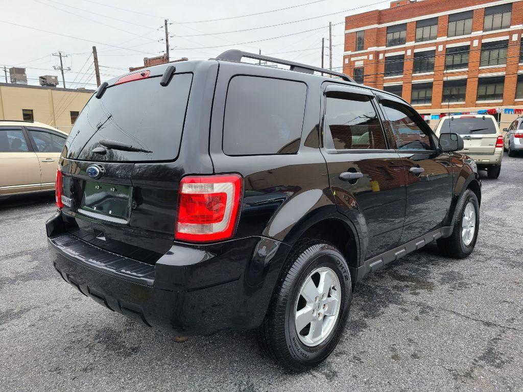 2012 BLACK FORD ESCAPE XLT (1FMCU9D74CK) with an 2.5L engine, Automatic transmission, located at 117 North Cameron Street, Harrisburg, PA, 17101, (717) 963-8962, 40.267021, -76.875351 - Photo #4
