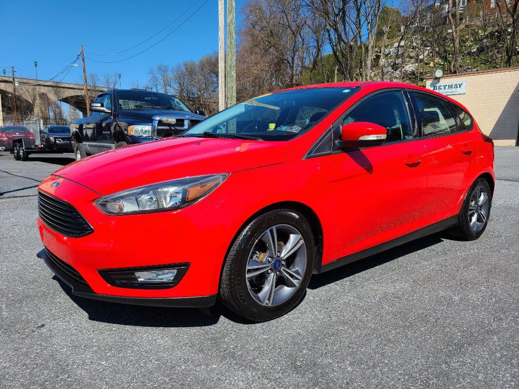 2016 RED FORD FOCUS SE (1FADP3KE0GL) with an 1.0L engine, Automatic transmission, located at 7981 Paxton Street, Harrisburg, PA, 17111, (717) 561-2926, 40.261490, -76.749229 - Photo #0