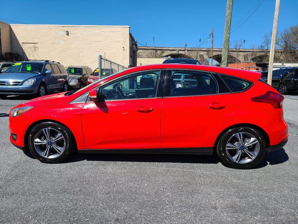 2016 RED FORD FOCUS SE (1FADP3KE0GL) with an 1.0L engine, Automatic transmission, located at 7981 Paxton Street, Harrisburg, PA, 17111, (717) 561-2926, 40.261490, -76.749229 - Photo #1