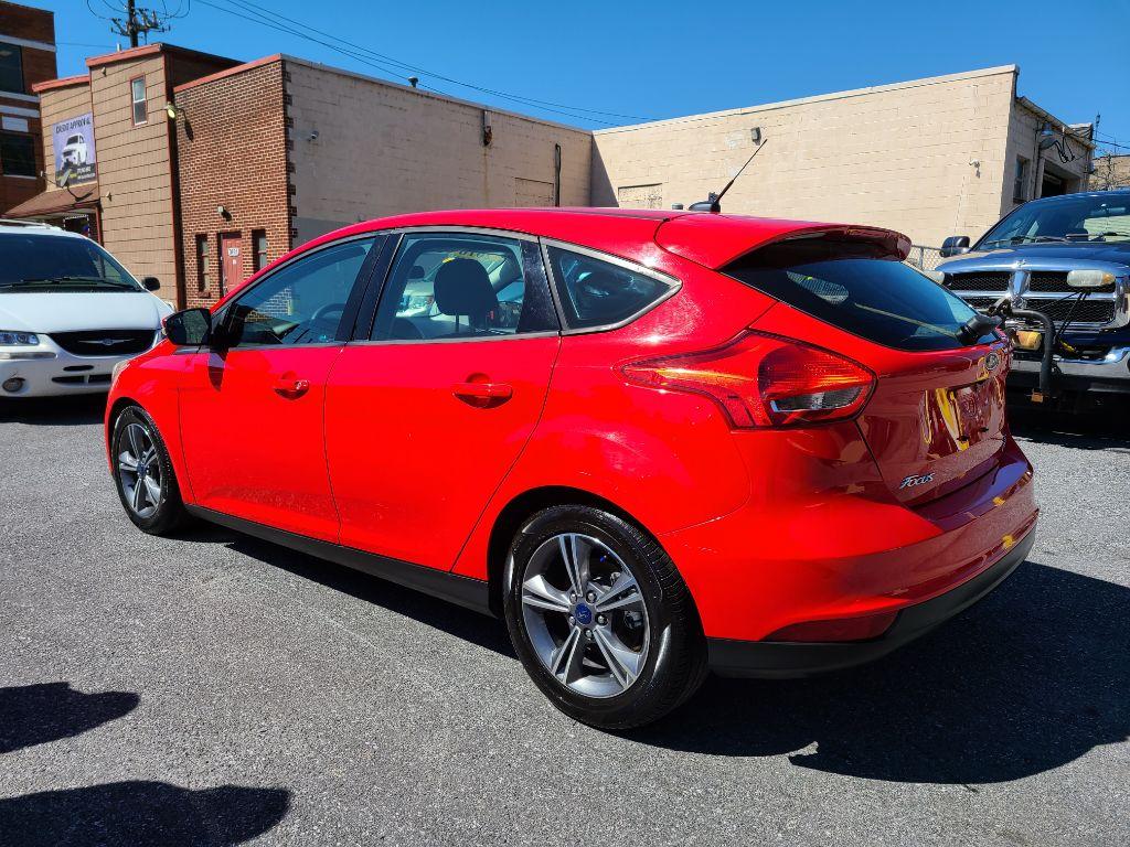 2016 RED FORD FOCUS SE (1FADP3KE0GL) with an 1.0L engine, Automatic transmission, located at 7981 Paxton Street, Harrisburg, PA, 17111, (717) 561-2926, 40.261490, -76.749229 - Photo #2