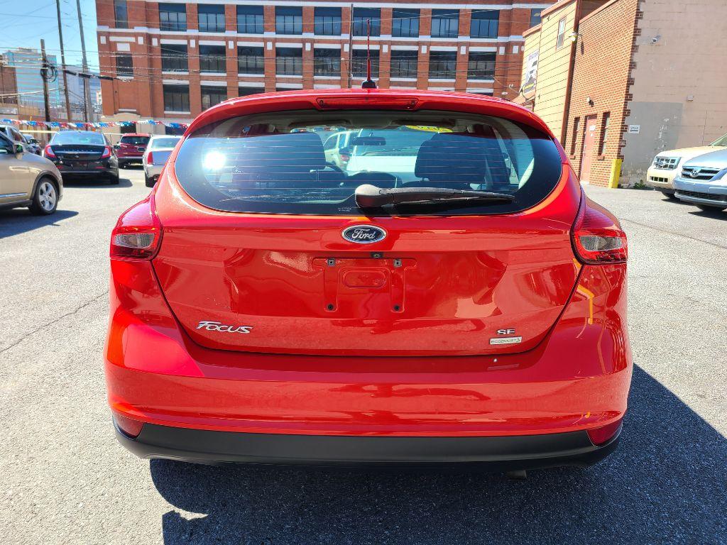 2016 RED FORD FOCUS SE (1FADP3KE0GL) with an 1.0L engine, Automatic transmission, located at 7981 Paxton Street, Harrisburg, PA, 17111, (717) 561-2926, 40.261490, -76.749229 - Photo #3
