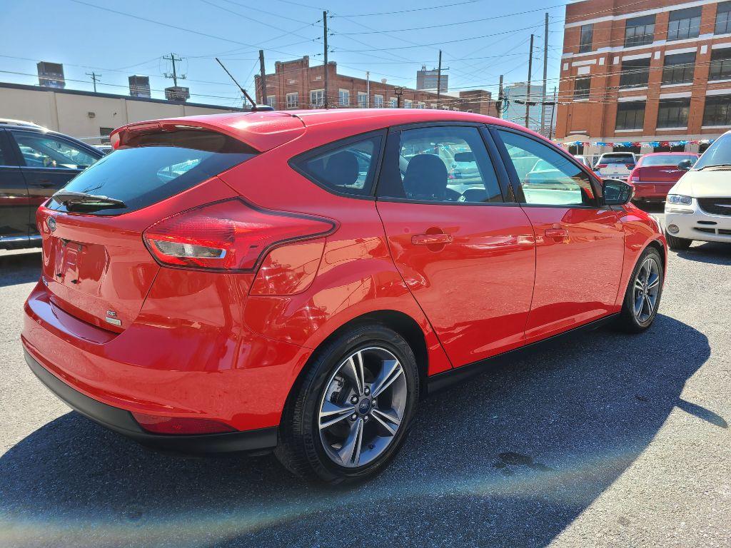 2016 RED FORD FOCUS SE (1FADP3KE0GL) with an 1.0L engine, Automatic transmission, located at 7981 Paxton Street, Harrisburg, PA, 17111, (717) 561-2926, 40.261490, -76.749229 - Photo #4