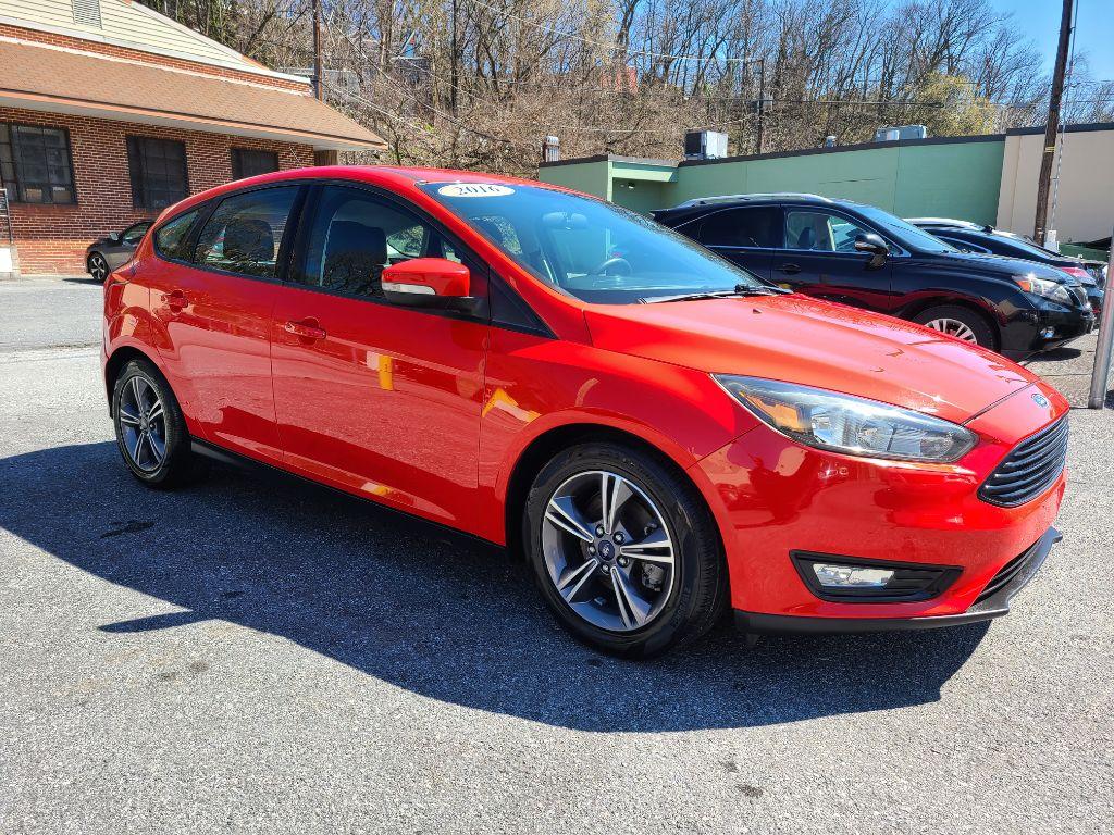 2016 RED FORD FOCUS SE (1FADP3KE0GL) with an 1.0L engine, Automatic transmission, located at 7981 Paxton Street, Harrisburg, PA, 17111, (717) 561-2926, 40.261490, -76.749229 - Photo #6
