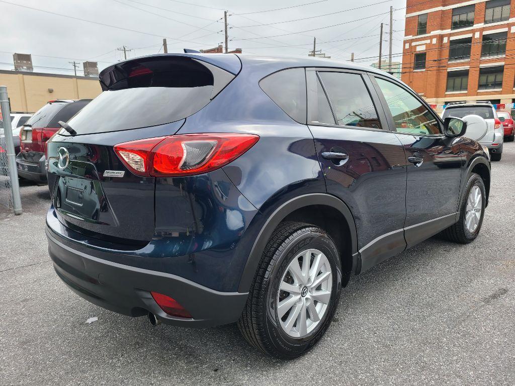 2015 BLUE MAZDA CX-5 TOURING (JM3KE4CY5F0) with an 2.5L engine, Automatic transmission, located at 117 North Cameron Street, Harrisburg, PA, 17101, (717) 963-8962, 40.267021, -76.875351 - Photo #4