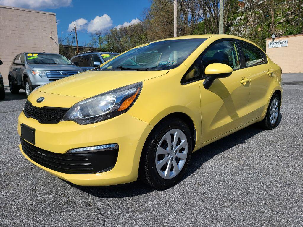 2016 YELLOW KIA RIO LX (KNADM4A32G6) with an 1.6L engine, 6-Speed Manual transmission, located at 117 North Cameron Street, Harrisburg, PA, 17101, (717) 963-8962, 40.267021, -76.875351 - Photo #0