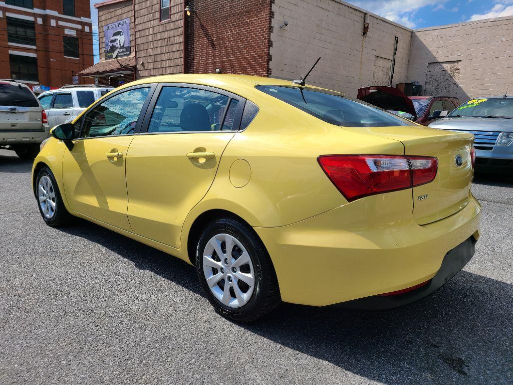 2016 YELLOW KIA RIO LX (KNADM4A32G6) with an 1.6L engine, 6-Speed Manual transmission, located at 117 North Cameron Street, Harrisburg, PA, 17101, (717) 963-8962, 40.267021, -76.875351 - Photo #2