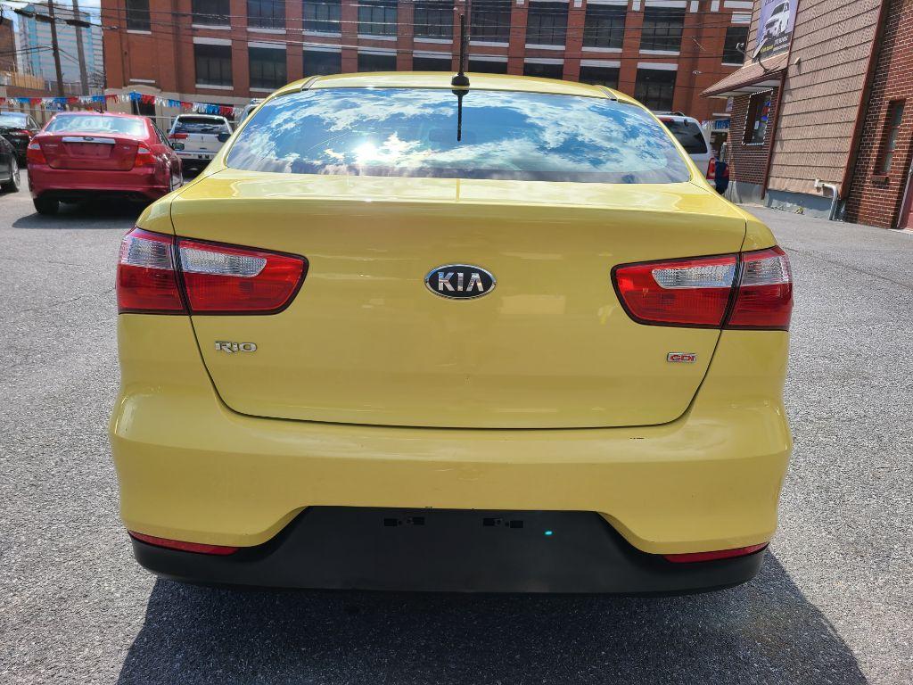 2016 YELLOW KIA RIO LX (KNADM4A32G6) with an 1.6L engine, 6-Speed Manual transmission, located at 117 North Cameron Street, Harrisburg, PA, 17101, (717) 963-8962, 40.267021, -76.875351 - Photo #3