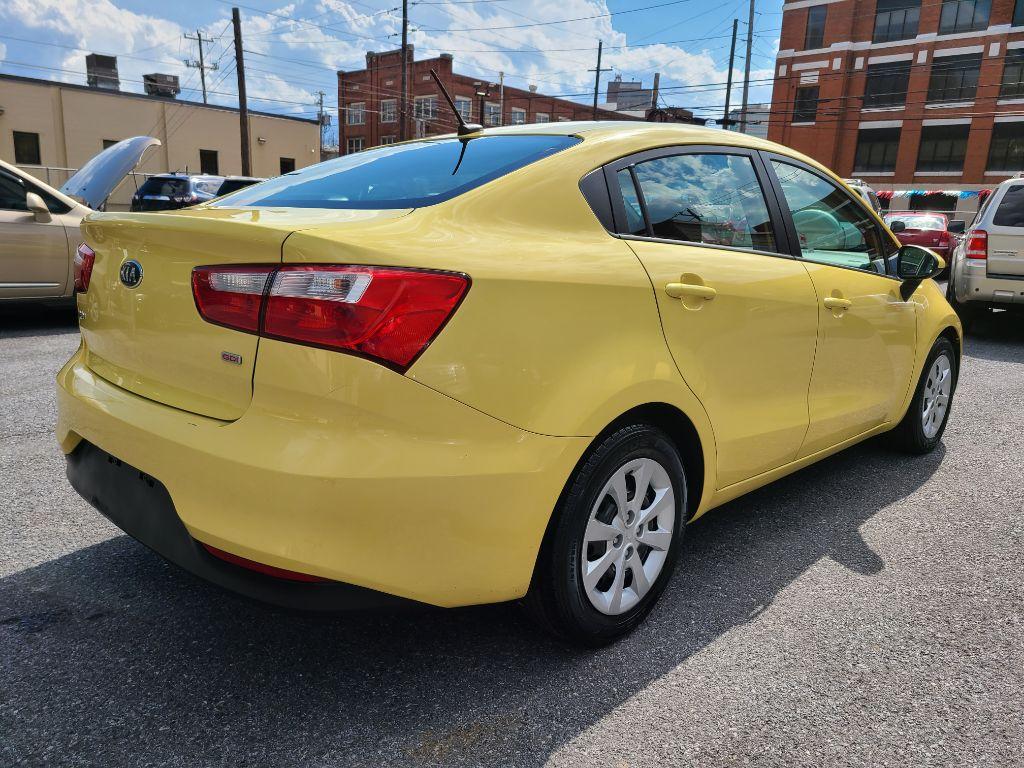 2016 YELLOW KIA RIO LX (KNADM4A32G6) with an 1.6L engine, 6-Speed Manual transmission, located at 117 North Cameron Street, Harrisburg, PA, 17101, (717) 963-8962, 40.267021, -76.875351 - Photo #4