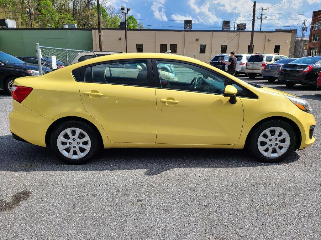 2016 YELLOW KIA RIO LX (KNADM4A32G6) with an 1.6L engine, 6-Speed Manual transmission, located at 117 North Cameron Street, Harrisburg, PA, 17101, (717) 963-8962, 40.267021, -76.875351 - Photo #5