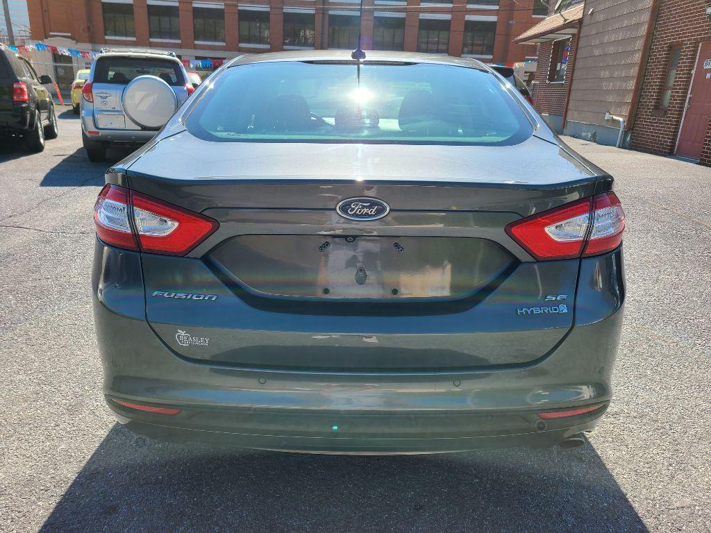 2015 GRAY FORD FUSION SE HYBRID (3FA6P0LU0FR) with an 2.0L engine, Continuously Variable transmission, located at 7981 Paxton Street, Harrisburg, PA, 17111, (717) 561-2926, 40.261490, -76.749229 - Photo #3